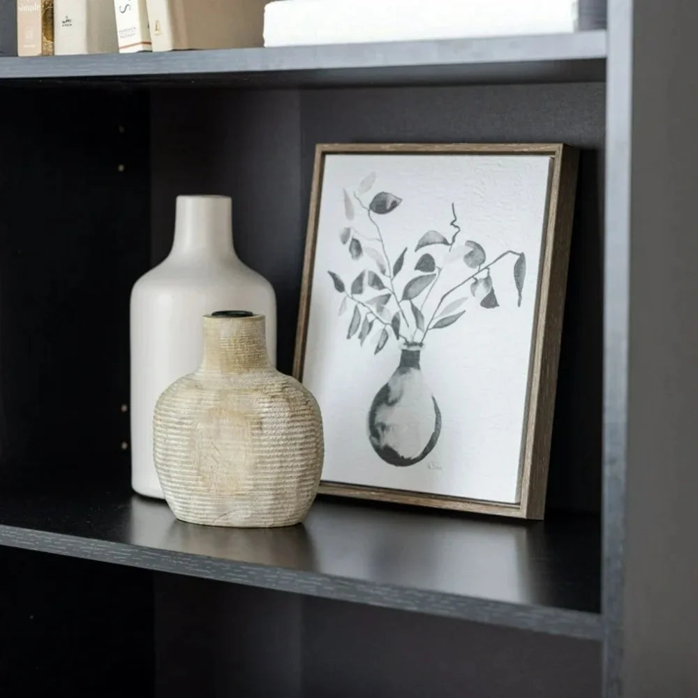 Five-shelf bookcase with adjustable shelves.